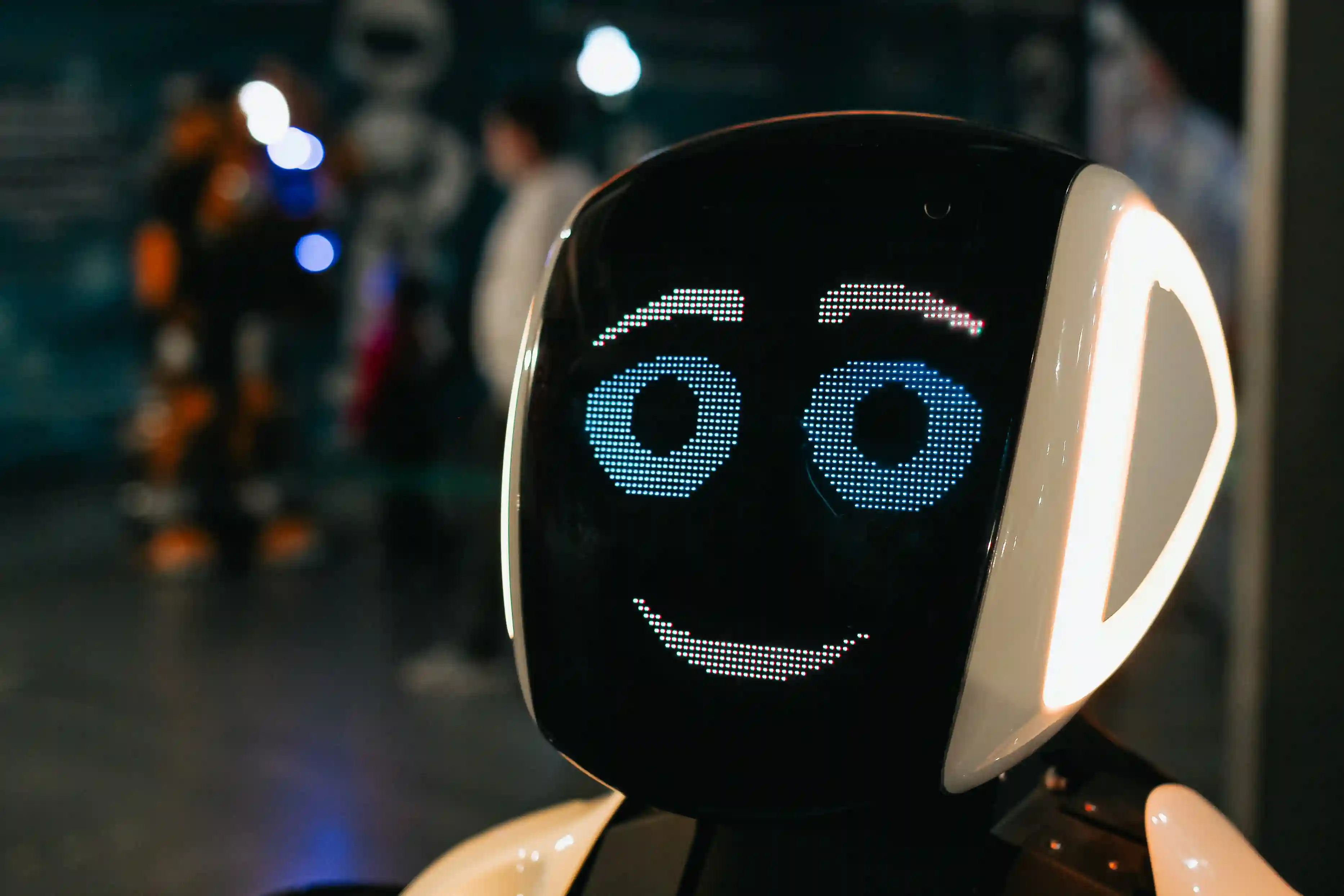 Smiling AI robot representing intelligent chatbot technology